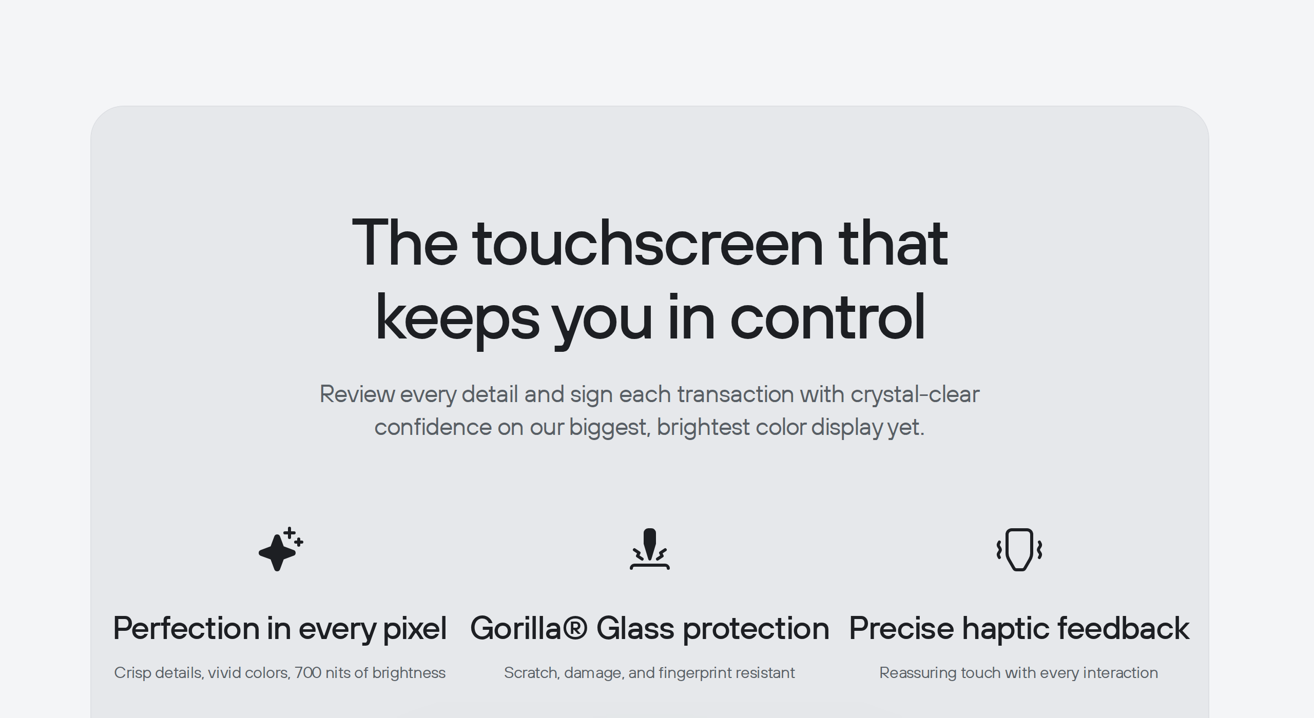 Trezor Safe 7 screen close-up reading The touchscreen that keeps you in control, above stats for Perfection in every pixel at 700 nits, Gorilla Glass protection, and precise haptic feedback